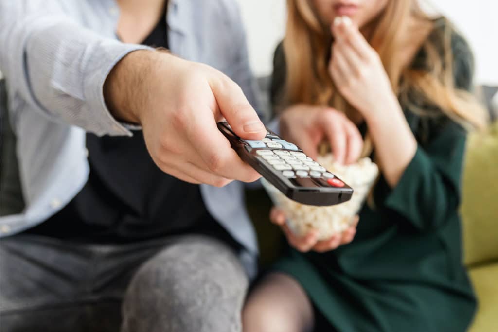 HBO case study, customer care, couple with tv remote control