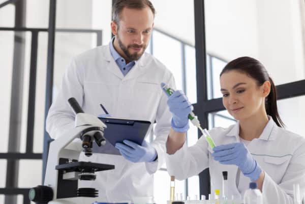 pharmaceutical client, case study, two scientists working in a lab
