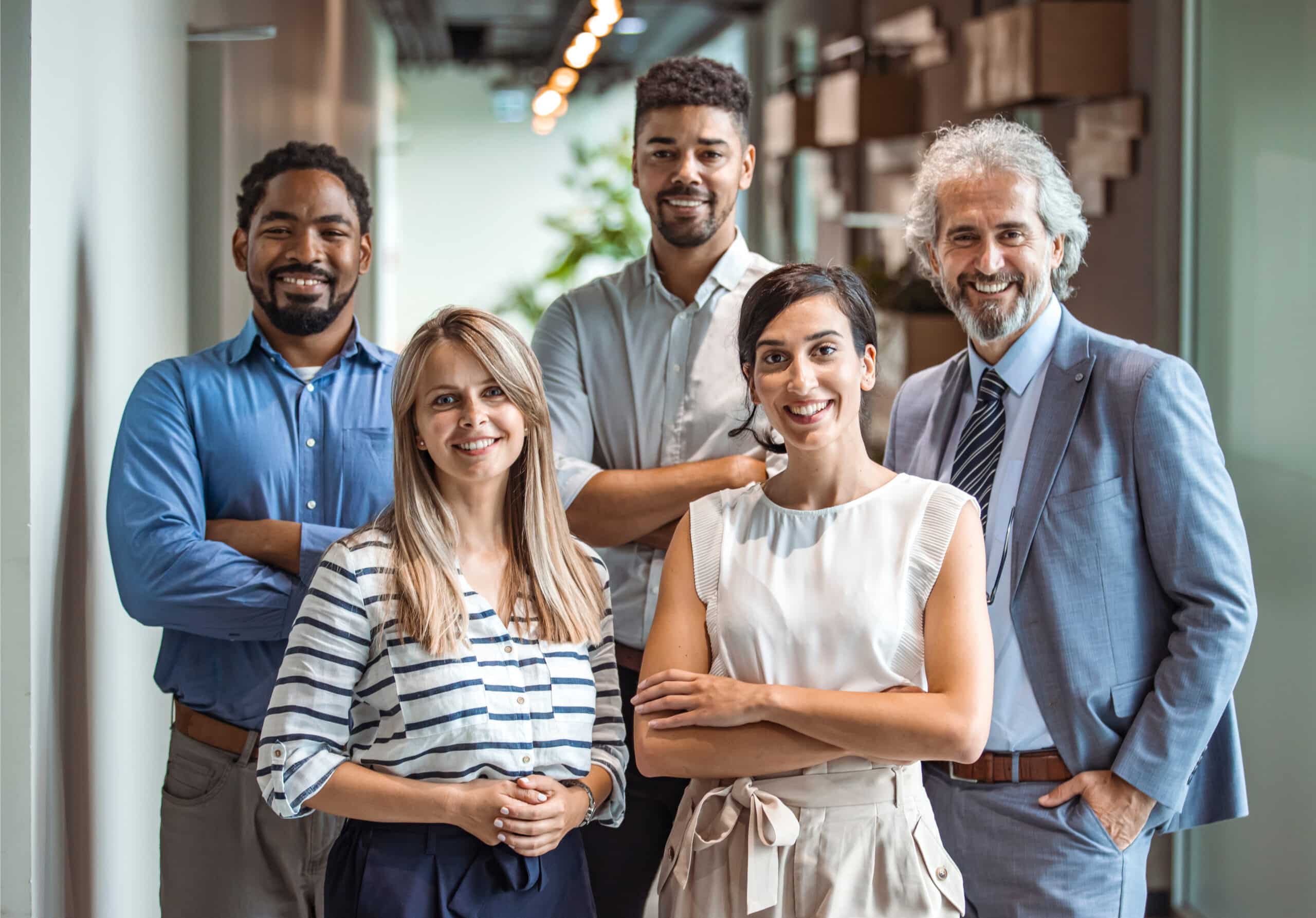 Group of sales professionals smiling