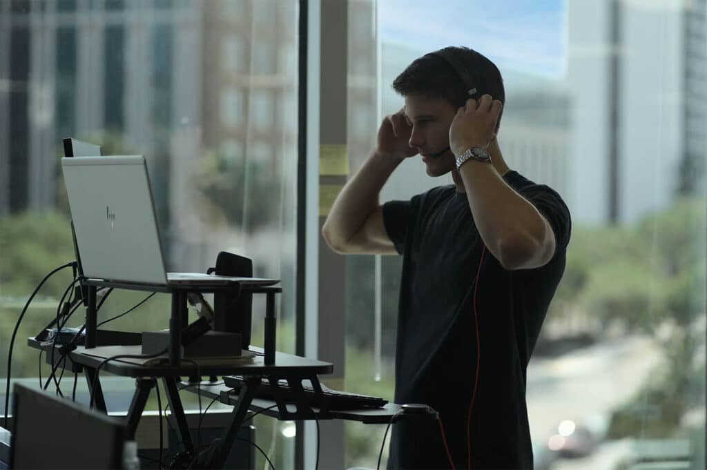 Sales agent working on telesales outsourcing in an office, representing inside sales outsourcing companies and how to outsource inside sales effectively