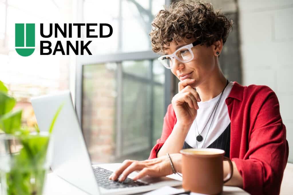 Woman looking at laptop