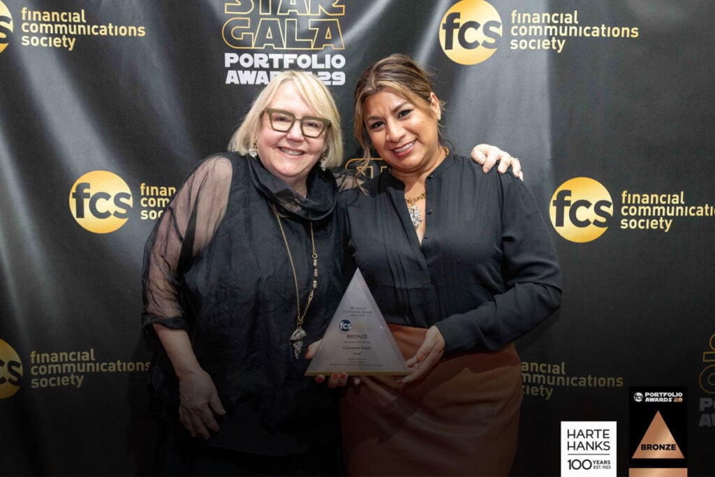 Award-winning financial marketing campaign recognized at the Financial Communications Society Awards. Two women celebrate Harte Hanks’ success in email strategy, highlighting excellence in financial marketing, email engagement, and consumer retail campaigns.