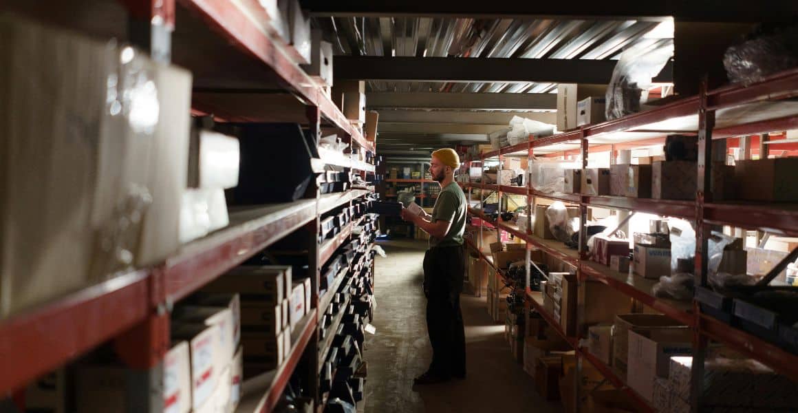 Loyal employee taking care of a customers packages.