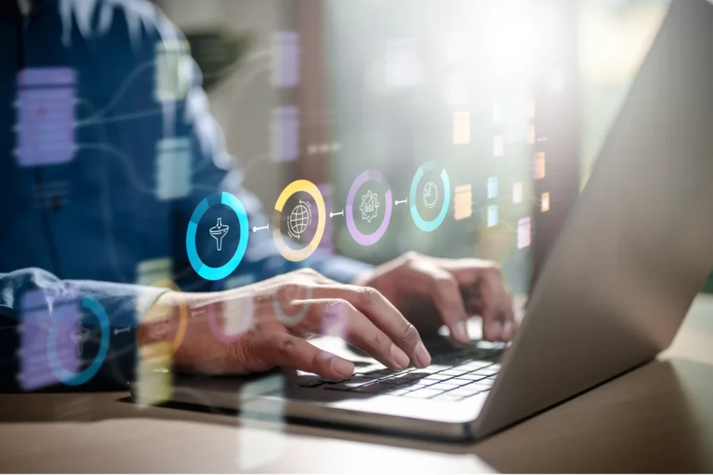 Digital representation of ABM support and omnichannel marketing strategies with an illustrated funnel and analytics icons on a laptop.