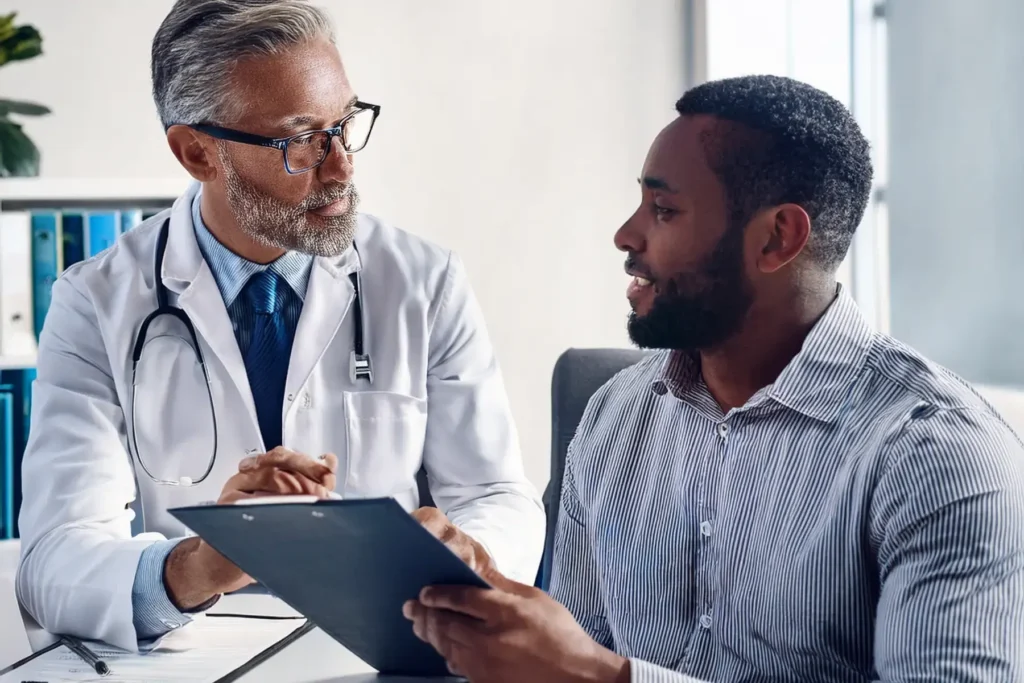 Doctor guiding member through plan changes to improve member experience, healthcare decisions, customer experience, trust, and regulatory compliance.